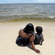 A mother and her son enjoying the sands of Mississippi’s Biloxi Beach in 2018.